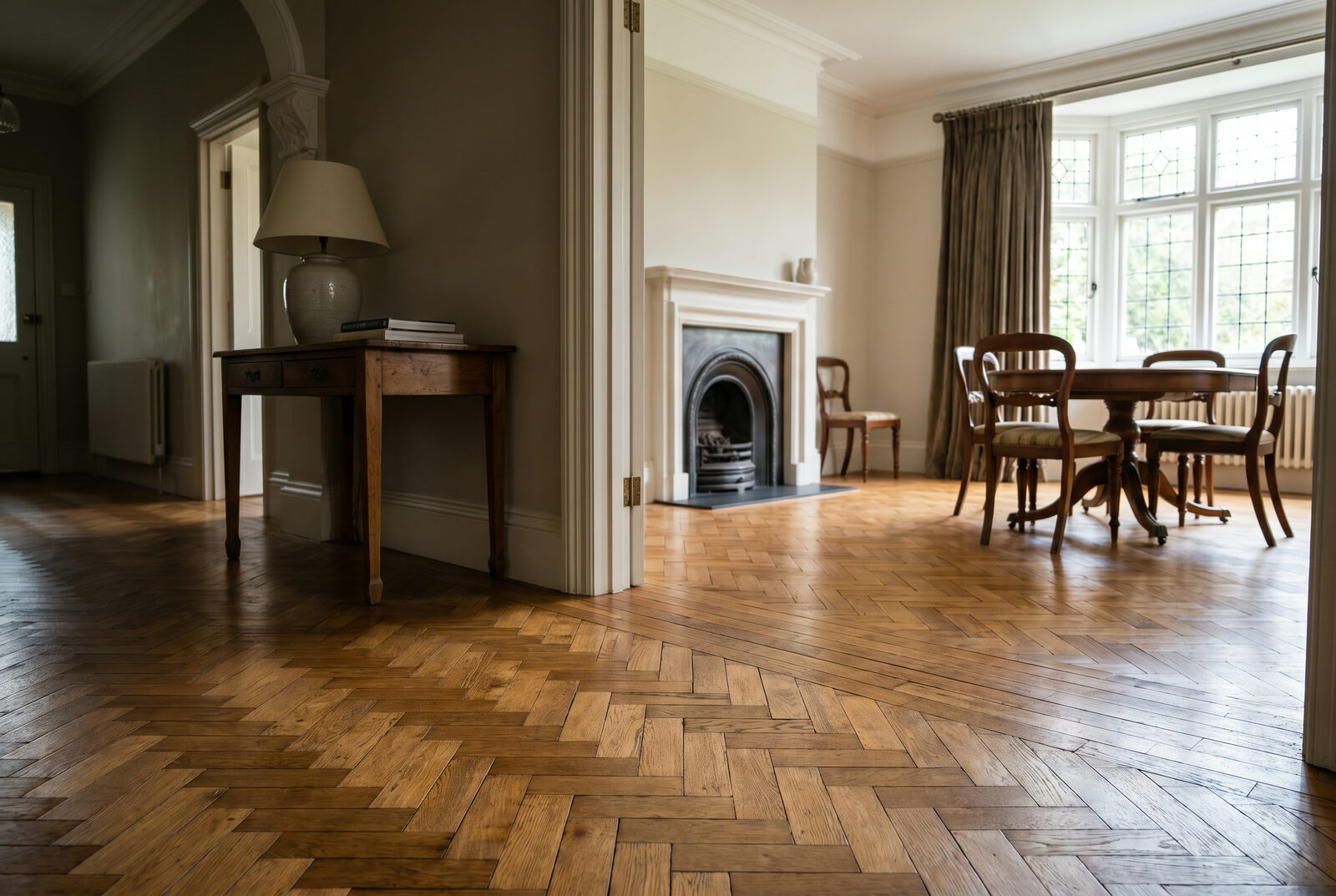 Wood flooring in a vaulted-ceiling hospitality lounge — wedding-venue hotel feel
