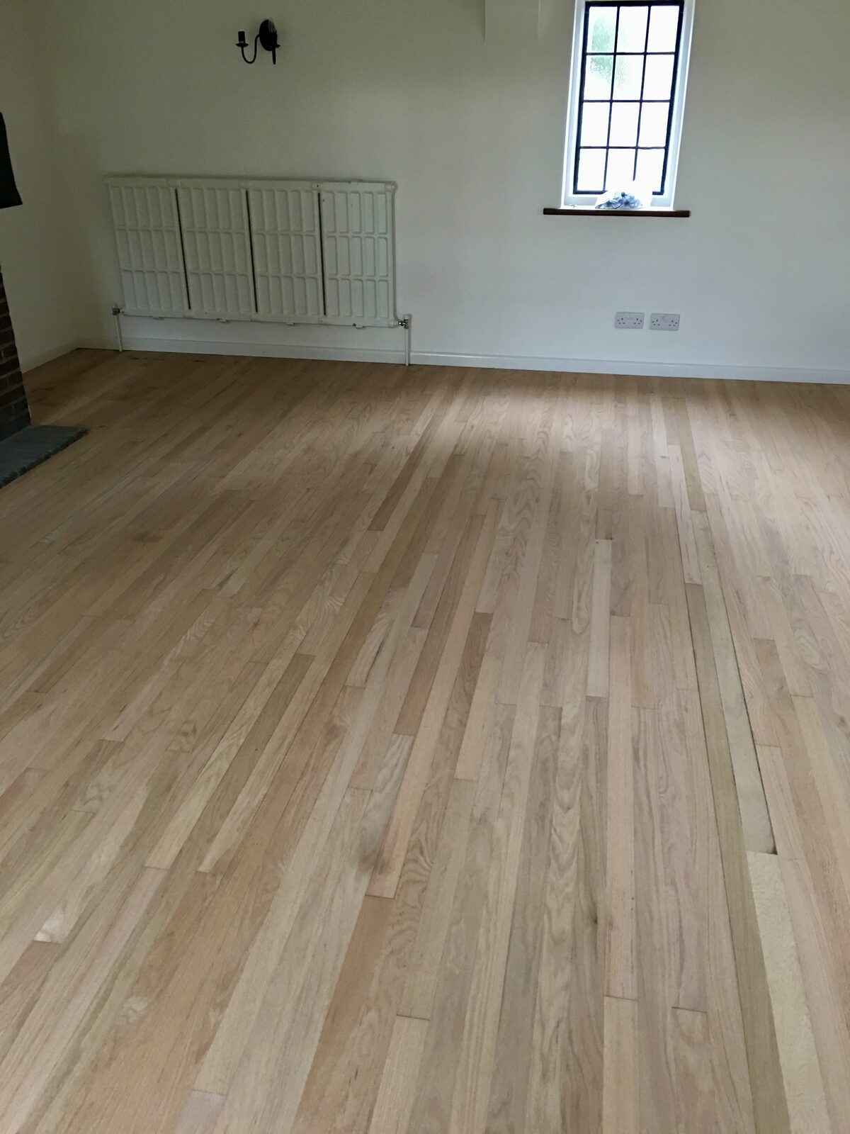 Restored oak flooring, of the kind we lay in Chichester Harbour homes