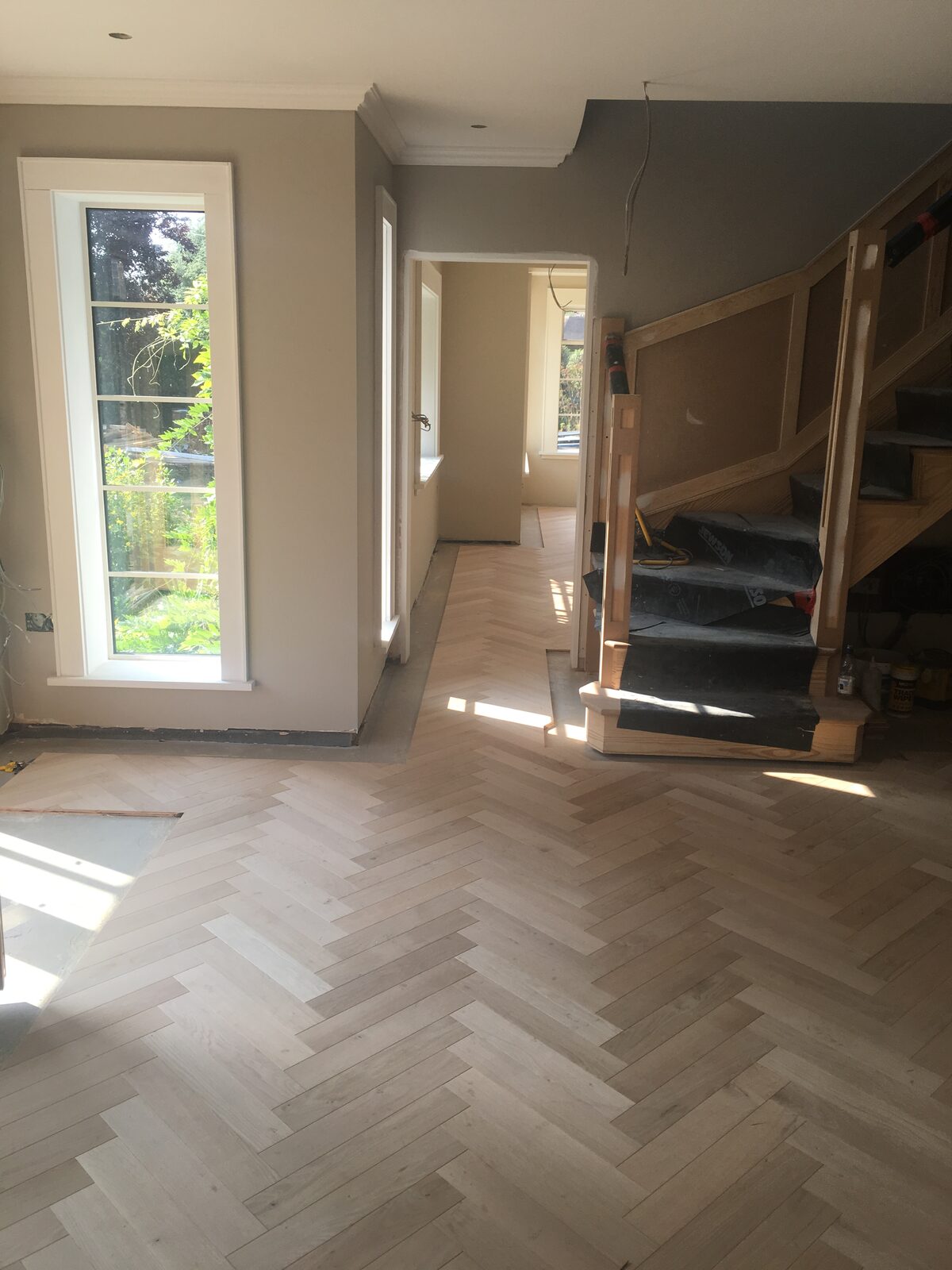 Engineered oak herringbone parquet, of the kind we lay in Chichester homes