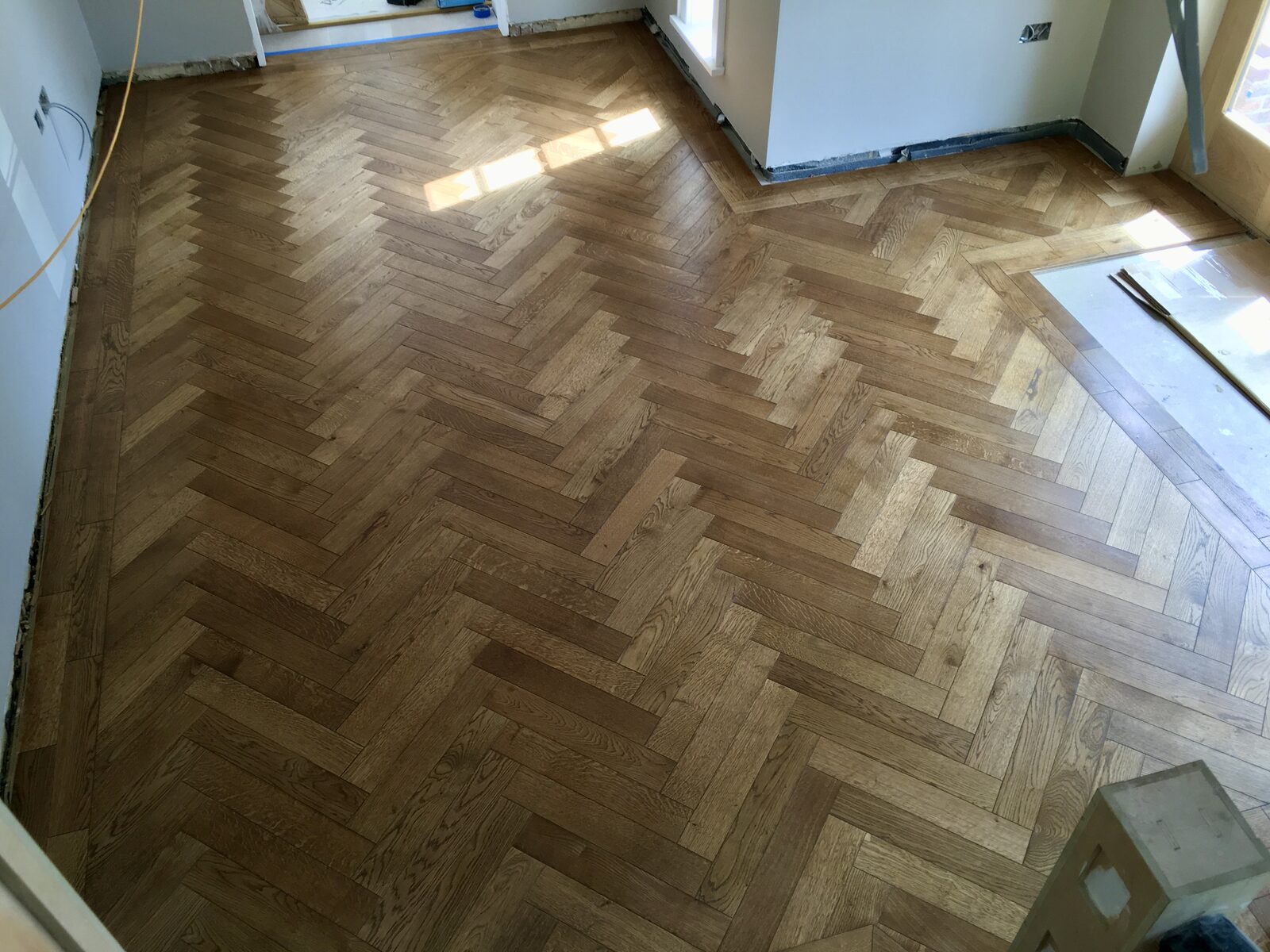 Engineered oak herringbone parquet laid by Forrestal Flooring
