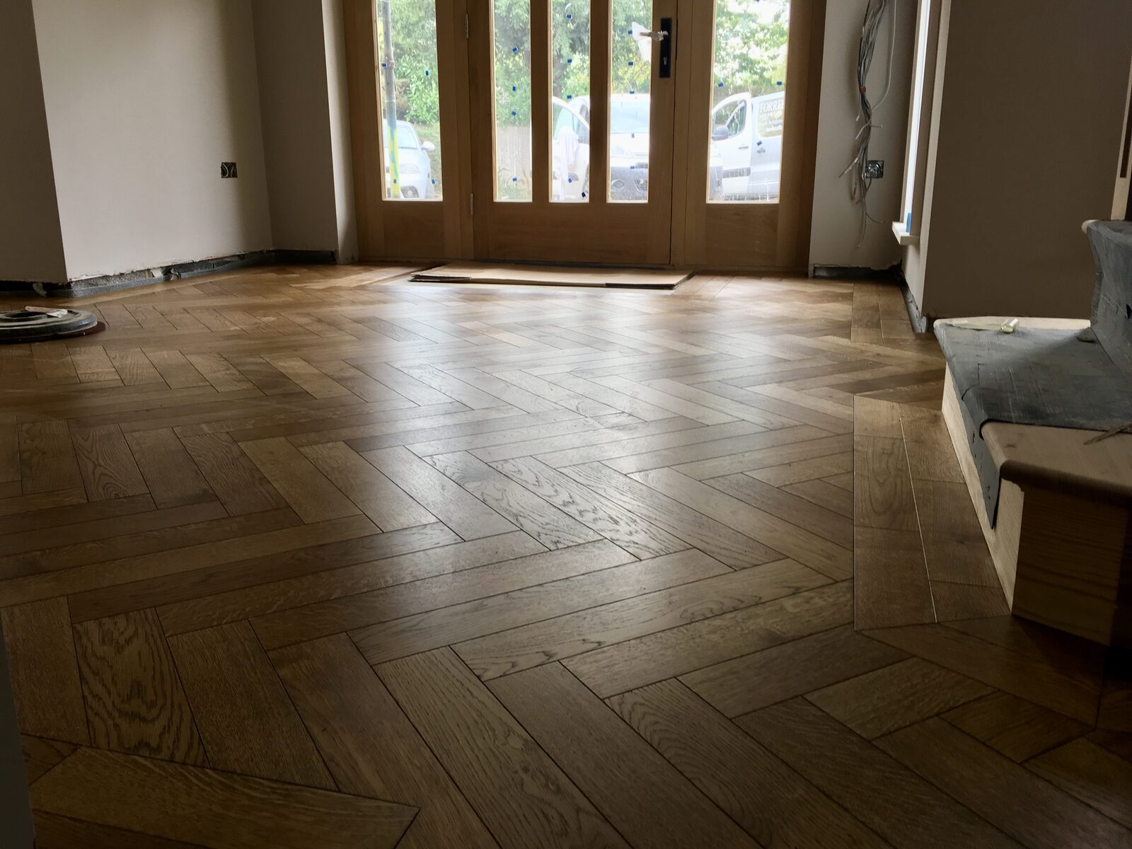 Engineered oak herringbone parquet in a Dunsfold home
