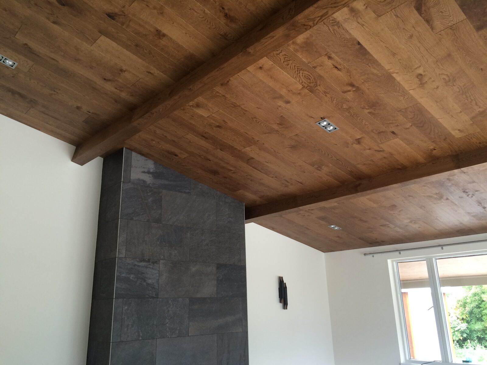 Rustic oak timber wall cladding laid by Forrestal Flooring