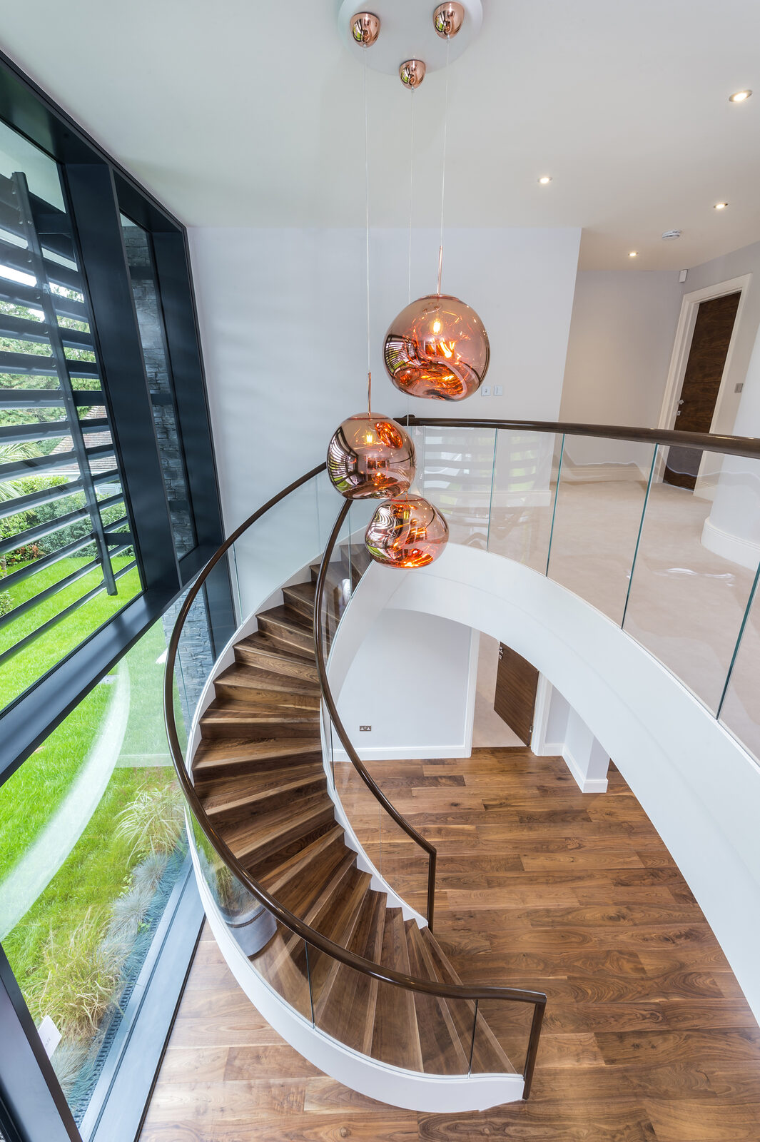 Prime-grade engineered walnut plank flooring, of the kind we lay in Bosham homes