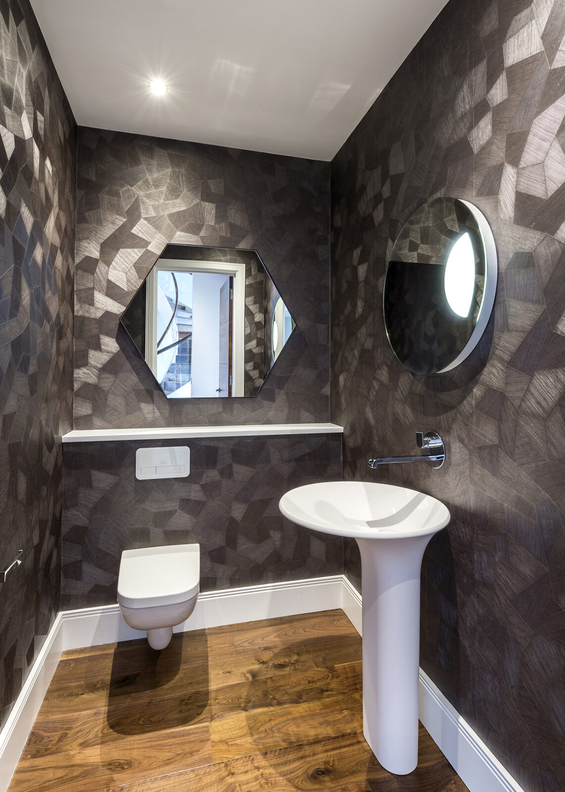Prime-grade engineered walnut plank flooring, of the kind we lay in Bosham homes