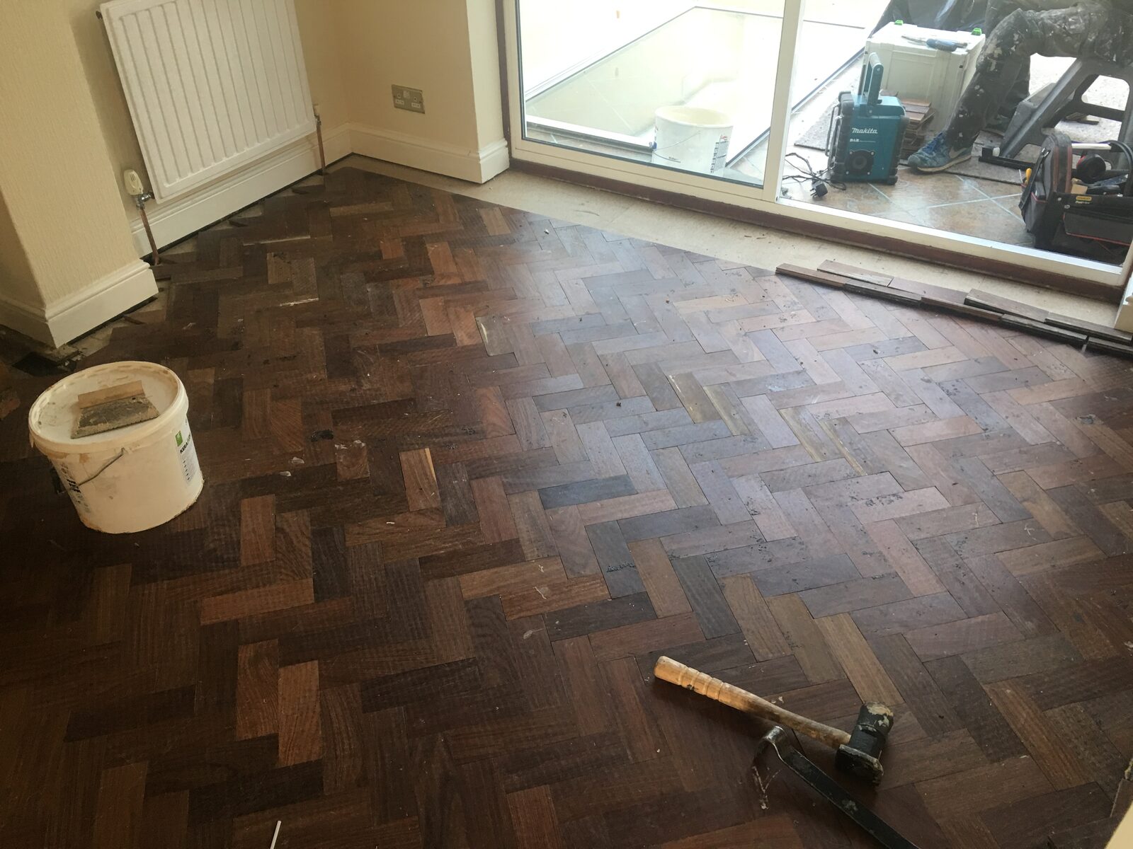 Restored teak herringbone parquet laid by Forrestal Flooring