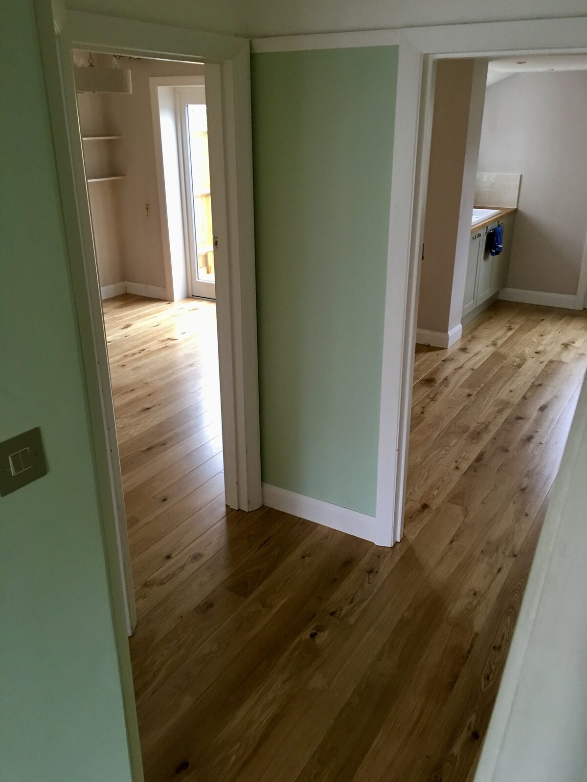 Rustic engineered oak plank flooring, of the kind we lay in Chichester Harbour homes