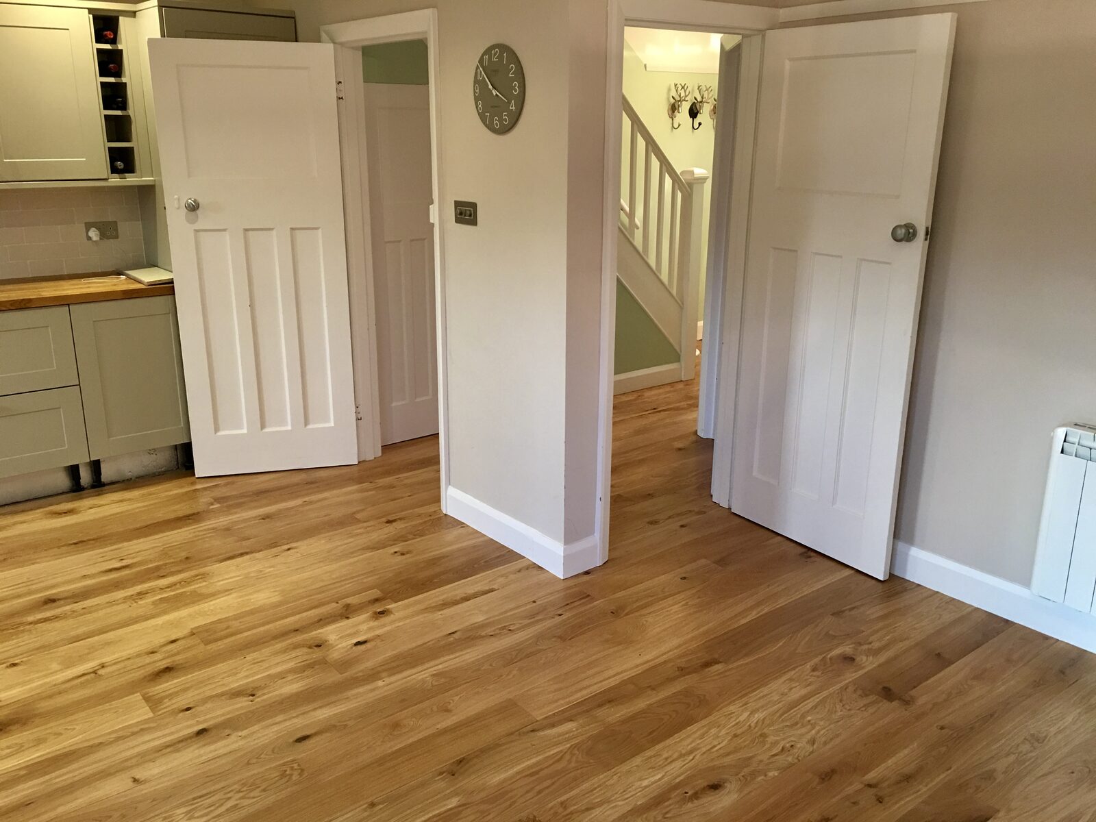 Rustic engineered oak plank flooring in a West Wittering home
