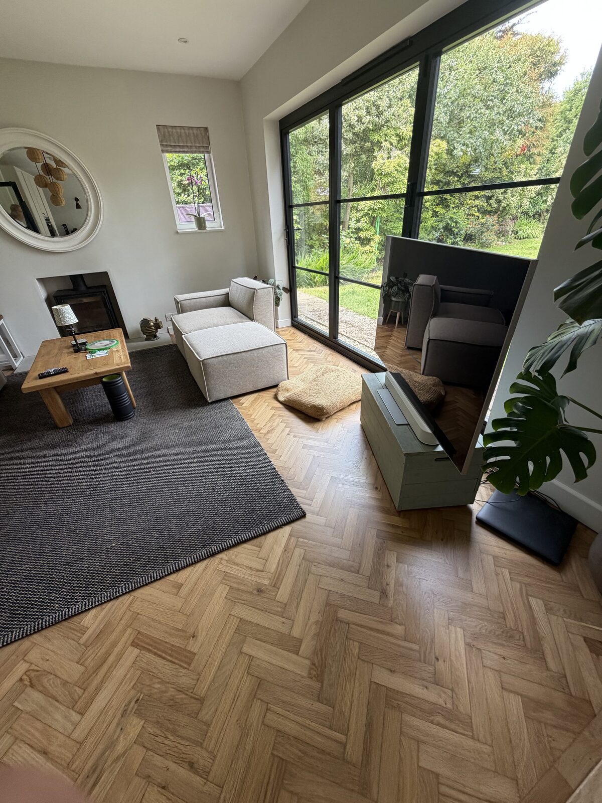Prime-grade whitewashed engineered oak plank flooring, of the kind we lay in Goodwood homes