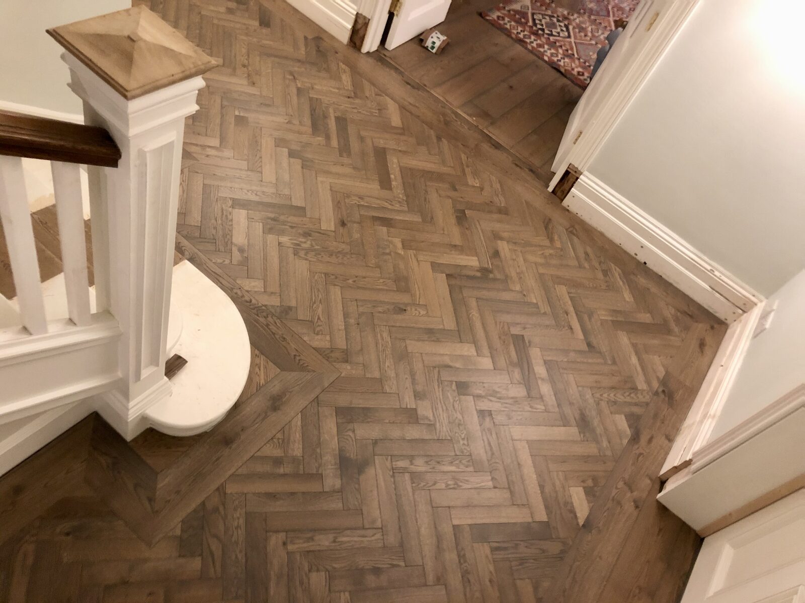 Engineered herringbone parquet in a Fishbourne home