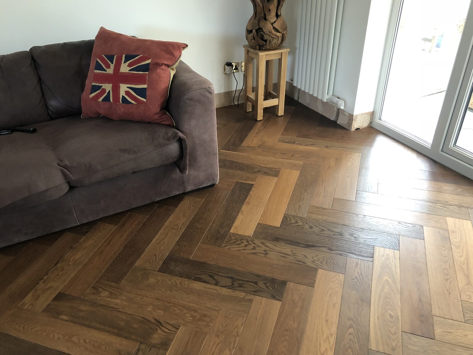 Engineered herringbone parquet laid by Forrestal Flooring