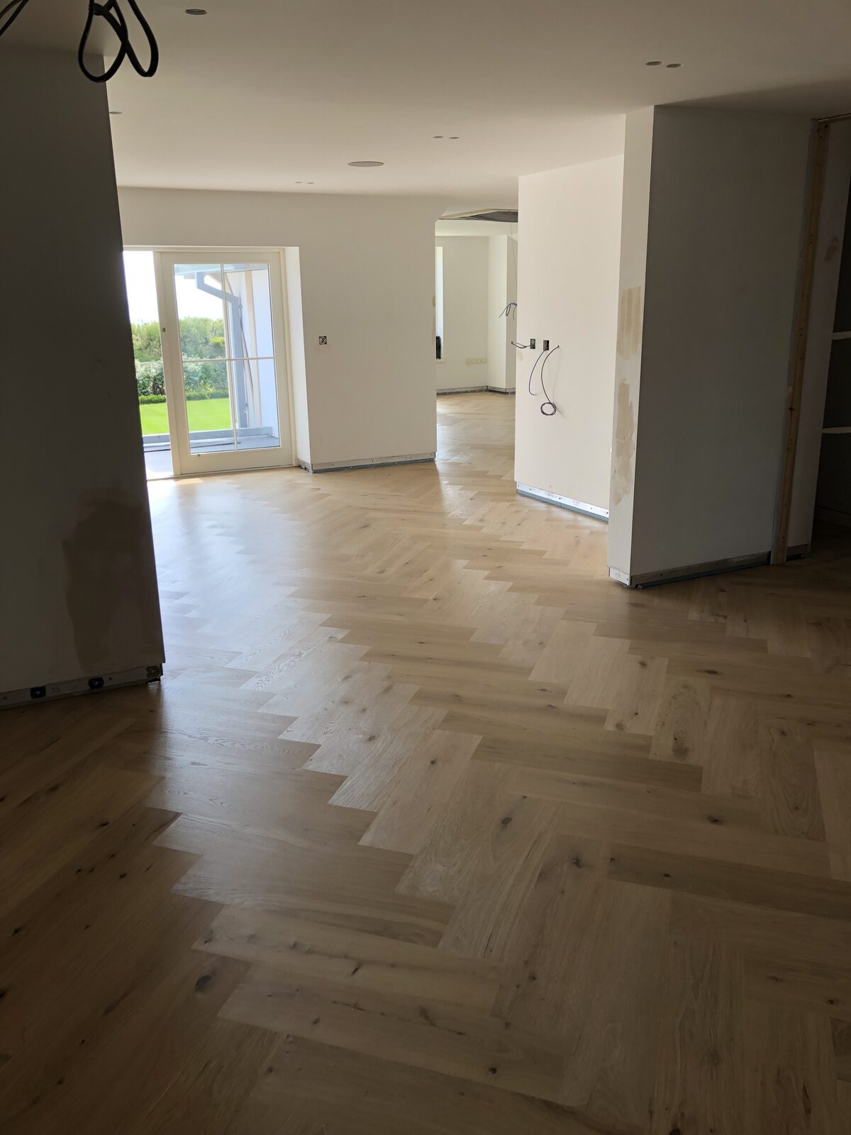 Engineered herringbone parquet, of the kind we lay in Rowlands Castle homes