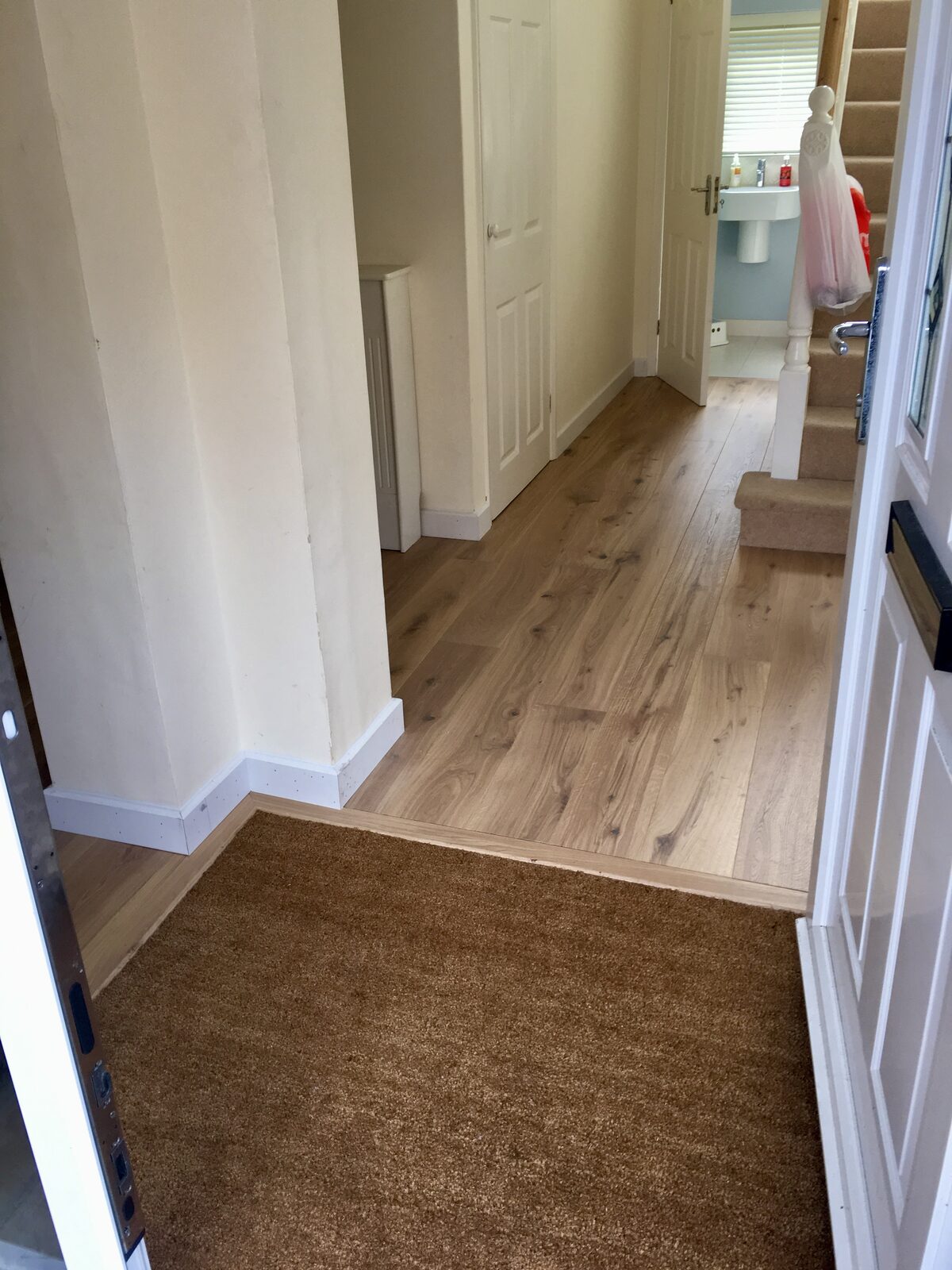 Rustic engineered oak plank flooring, of the kind we lay in Haslemere homes