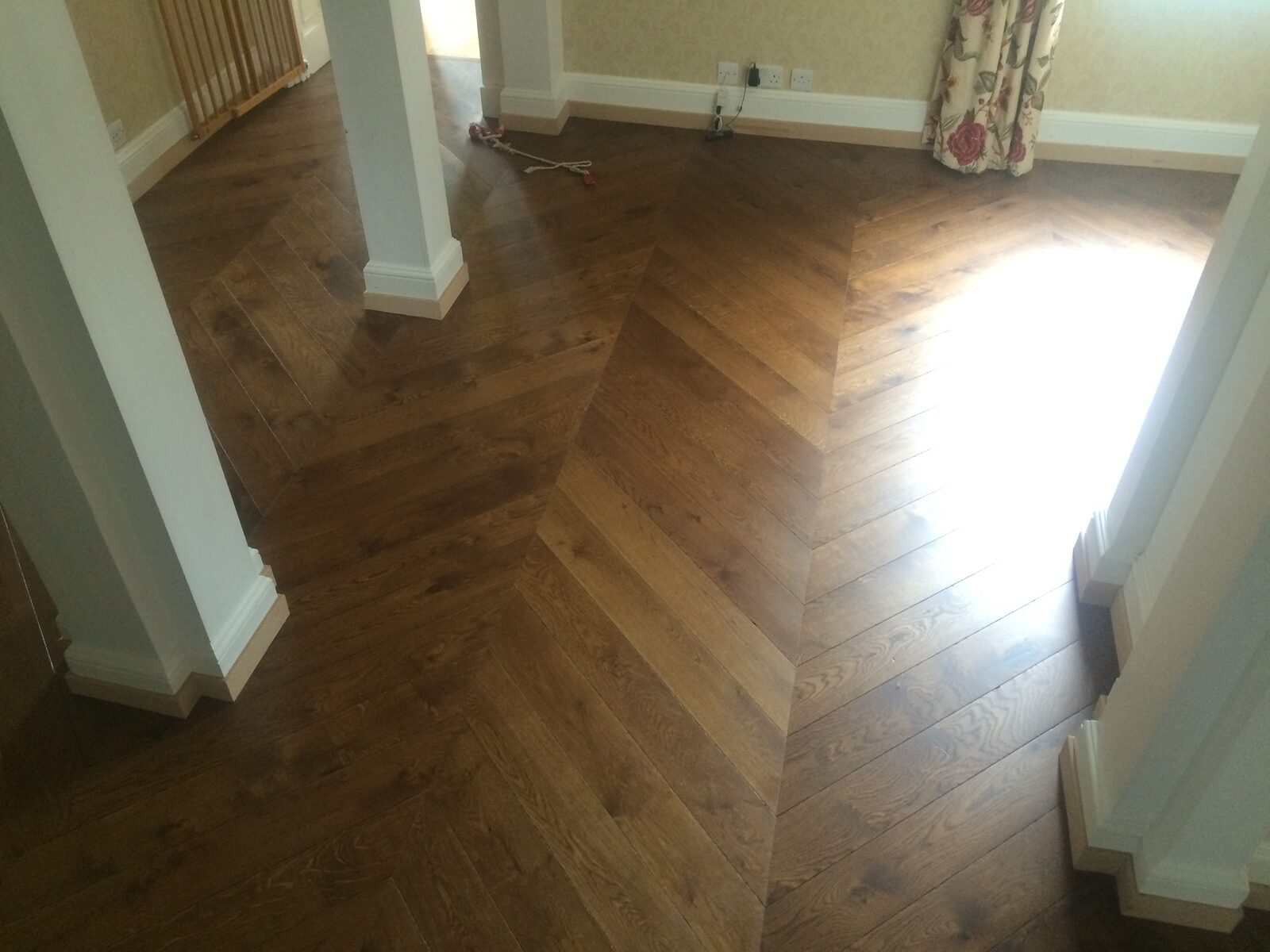 Rustic engineered chevron parquet in a Petworth home