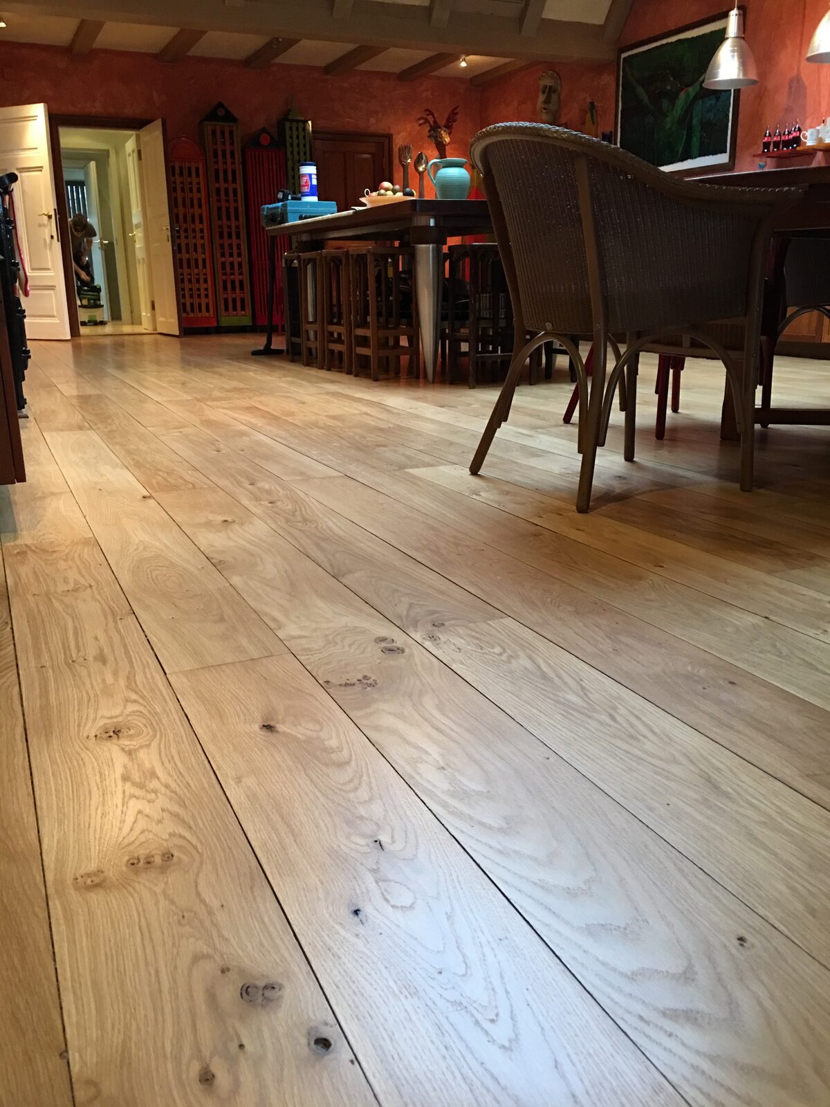 Restored engineered oak plank flooring, of the kind we lay in Petworth homes