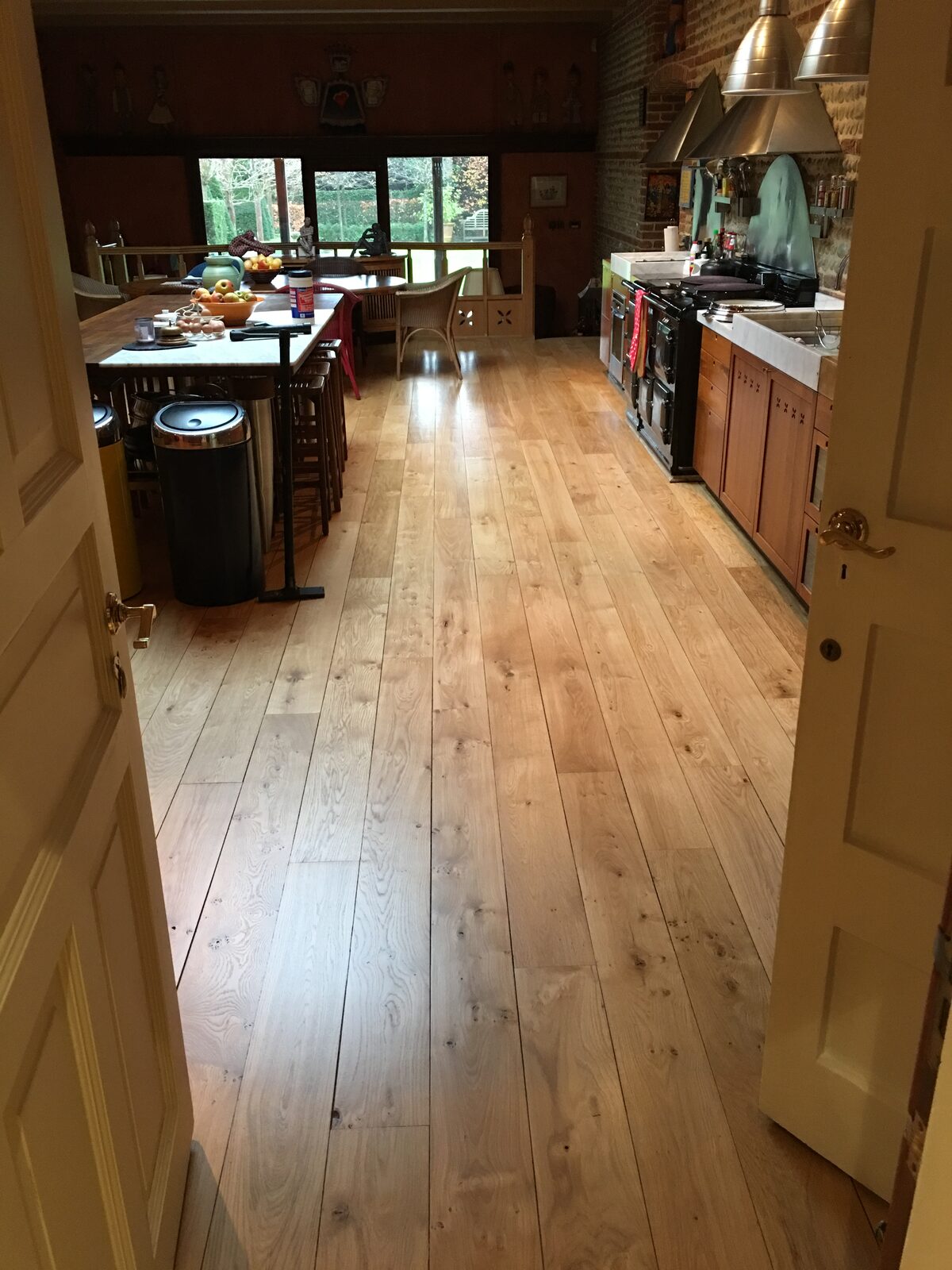 Restored engineered oak plank flooring, of the kind we lay in Bosham homes