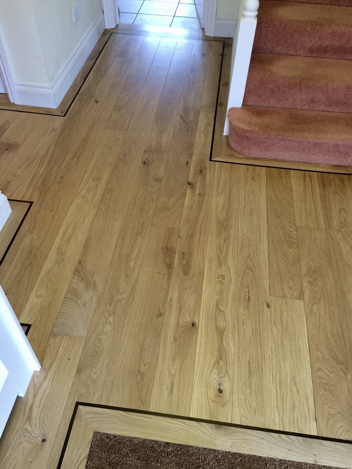 Engineered oak plank flooring, of the kind we lay in Liphook homes