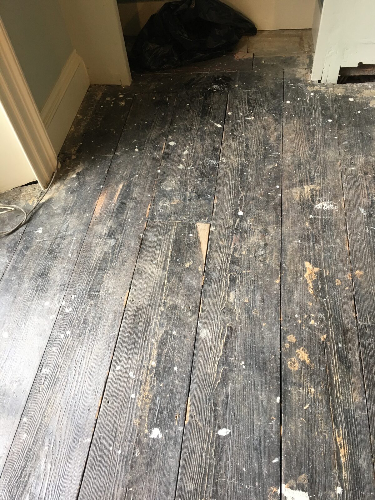 Restored pine floorboards, of the kind we lay in Liphook homes