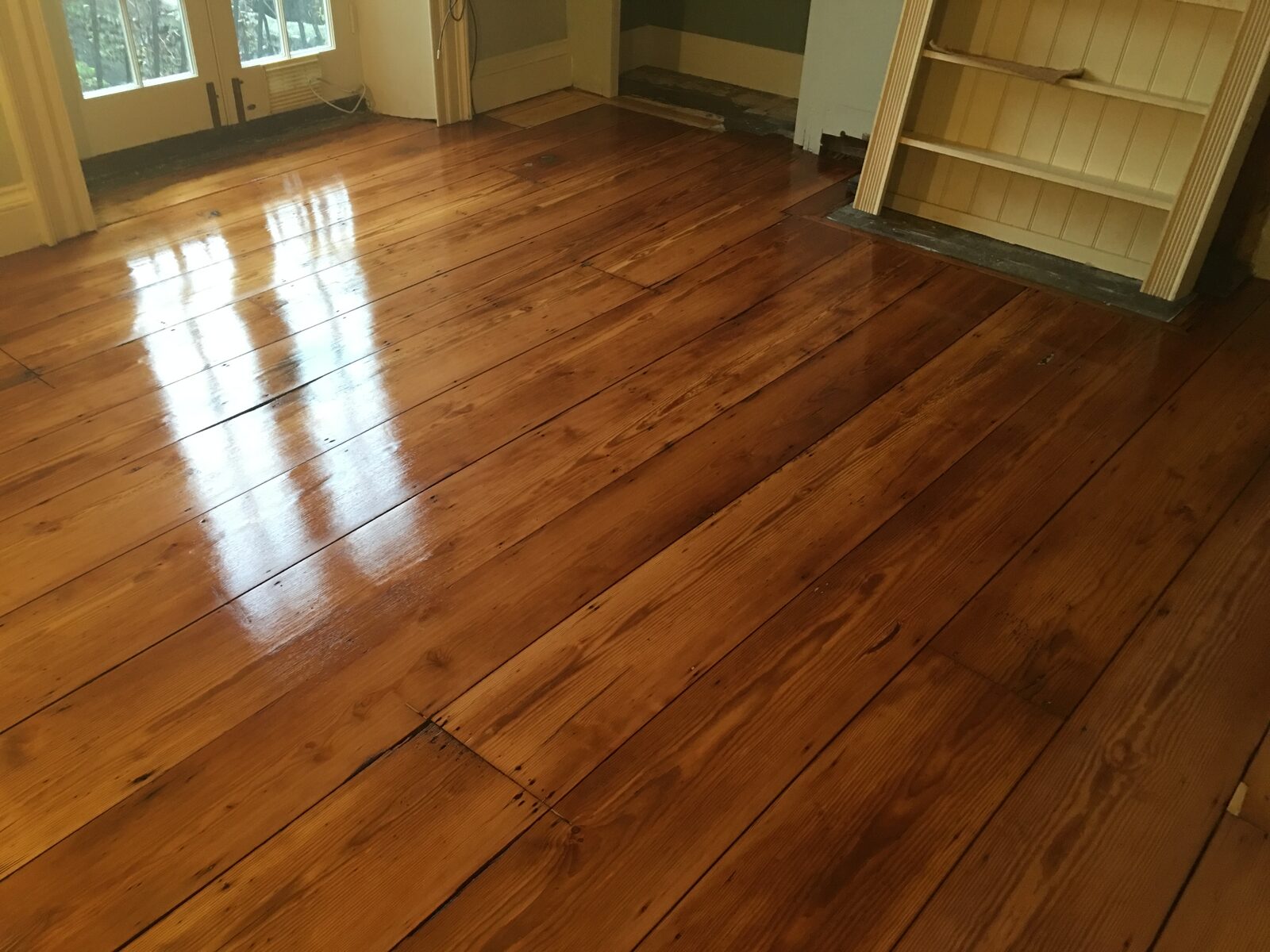 Restored pine floorboards in a West Chiltington home