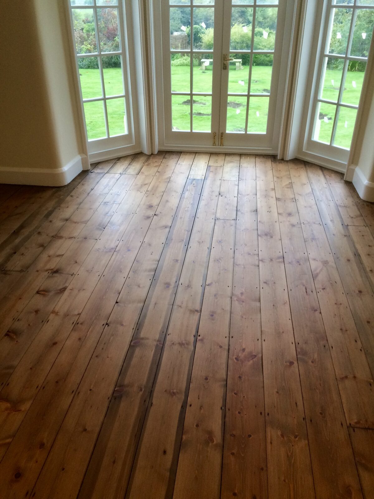 Restored wood flooring, of the kind we lay in Steyning homes