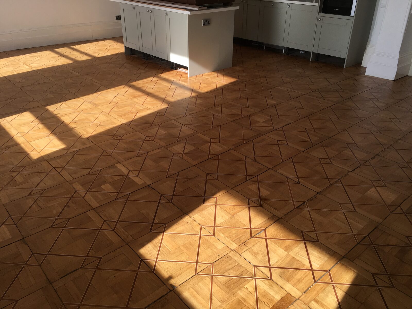 Restored oak parquet in a Duncton home