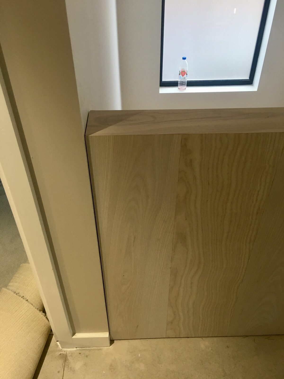 Engineered ash stairwell cladding in a Winchester home