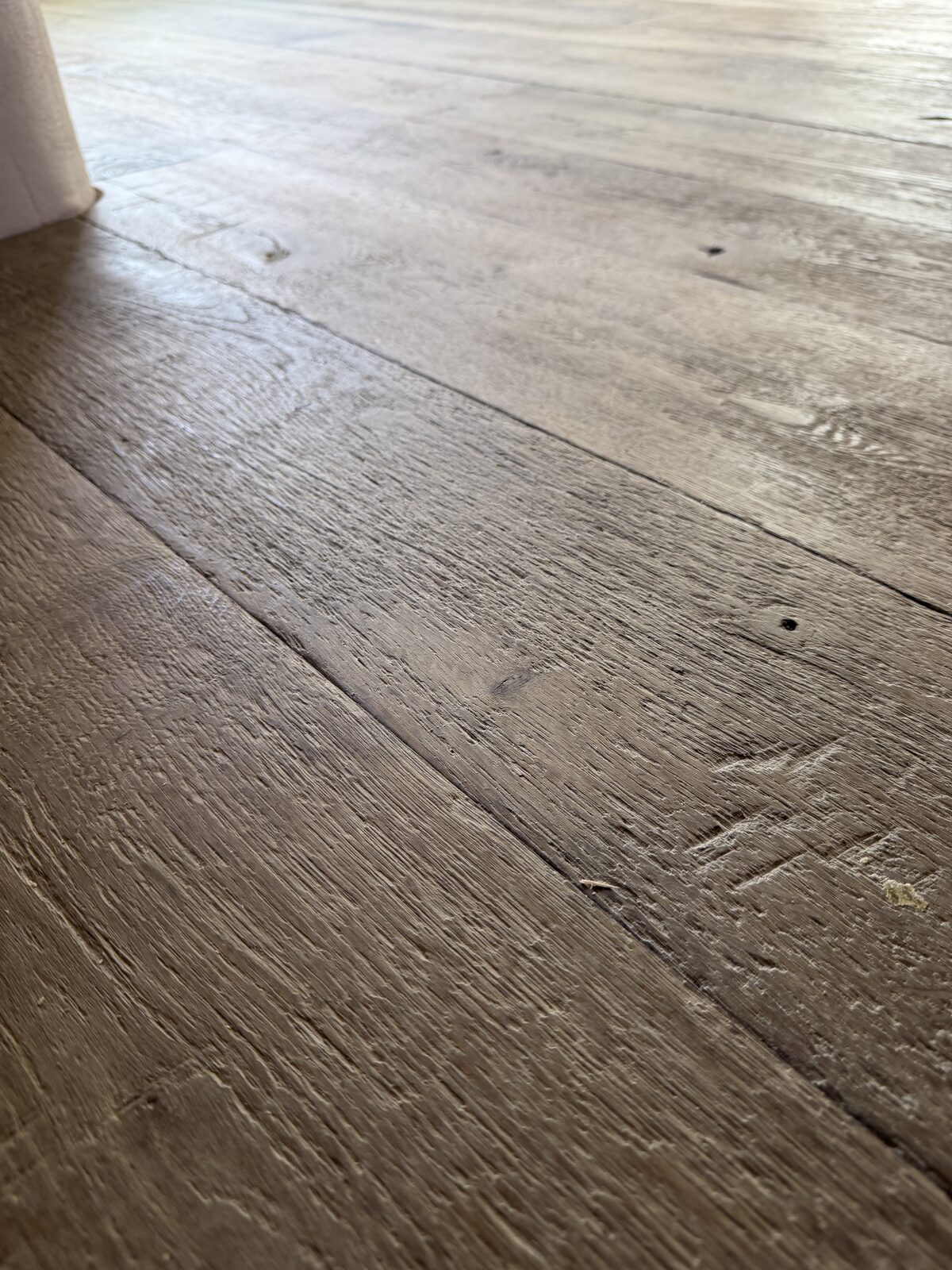 Rustic engineered plank flooring, of the kind we lay in Rowlands Castle homes