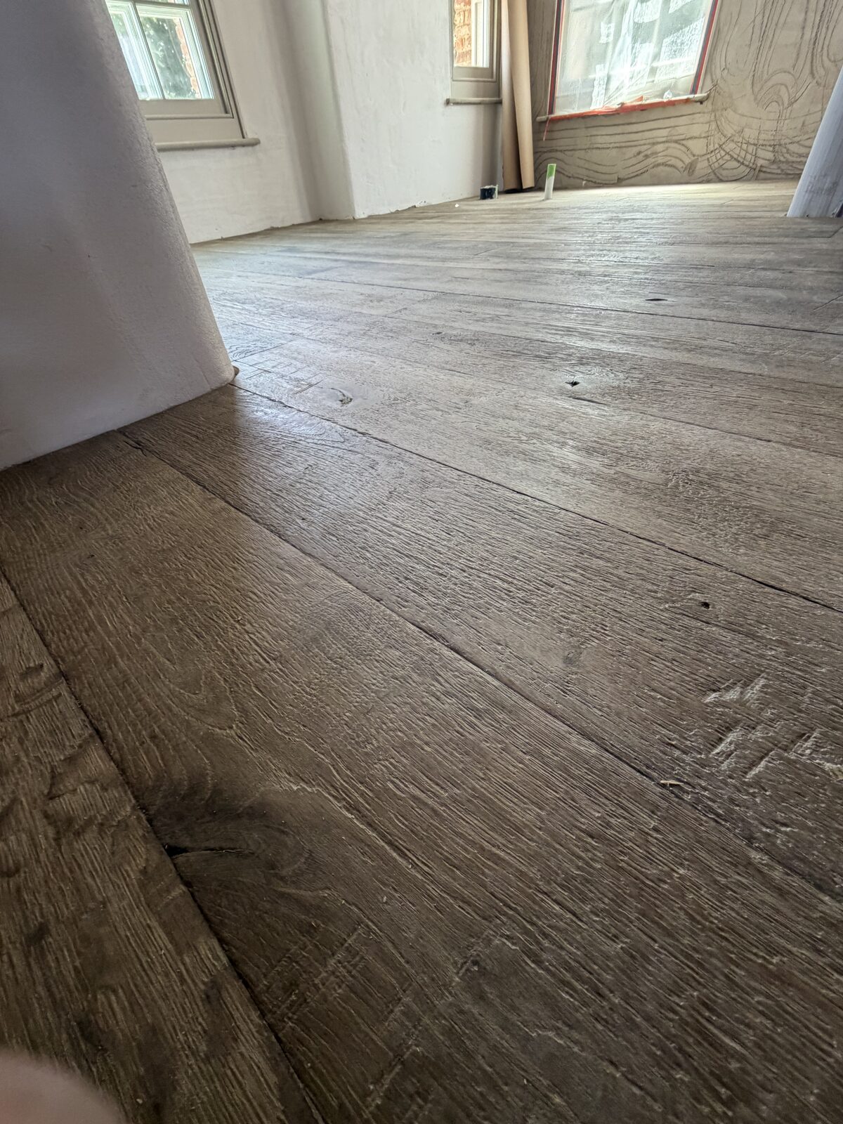 Rustic engineered plank flooring, of the kind we lay in Rowlands Castle homes