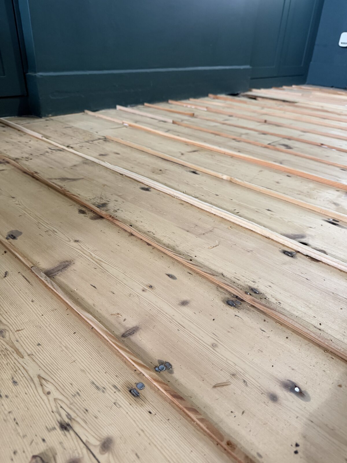 Pine slivers inserted into board gaps, Gap-filling & re-sealing only we install
