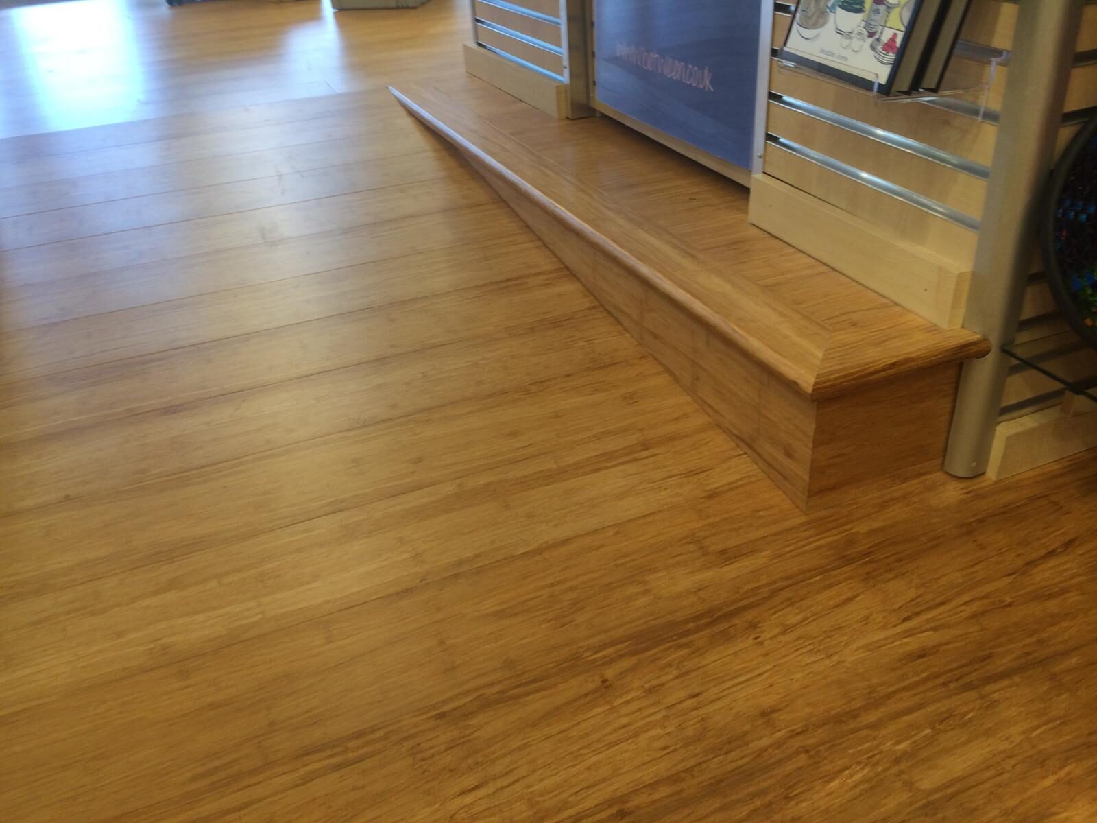Strand-woven bamboo plank flooring with a step nosing